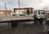 Работаю на данной Воровайке. Борт до 5тн. Стрела из под себя берет не более 2тн. Вылет стрелы 8м - на полном вылете груз держит не более 500кг