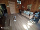 Укладка ламината по всей площади первого этажа