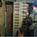 обкладка банных печей облицовочным кирпичем,с элементом перегородки