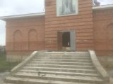 На церкви.Очень большое крыльцо 