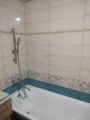 Укладка плитки в ванной с установкой сантехники 