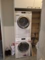 Стиральная и сушильная машины в колону