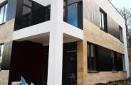 Загородный дом в г. Ялта. Материал: террасная доска, траветин, фасадная шпаклевка