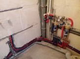 Монтаж коллекторного узла трубы хенко (металлопластик), установка счетчиков воды, установка фильтров тонкой очистки
