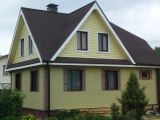 Полная реконструкция дома с отделкой фасада плиткой Каньон и заменой кровли.