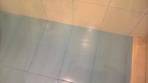 укладка плитки, переход от пола на стену