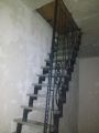Изготовление и монтаж лестницы с коваными элементами.