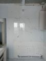 Укладка керамогранита 60*60 на стены фартука