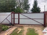 Монтаж откатных ворот со встроенной калиткой