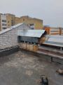 Замена, сварка сгнившего металлического козырька над вытяжкой на крыше жилого дома