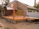 Залит фундамент под каркасный пристрой 9х9 м с крыльцом. Сделана обвязка