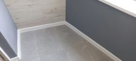 Укладка плитки, покраска стен, отделка стен ламинатом